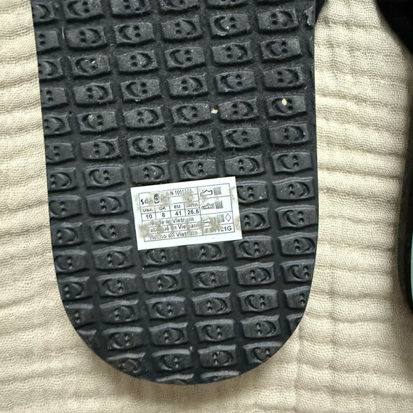 Sanuk Black Flip Flops with aqua flower design - Picture 3 of 3